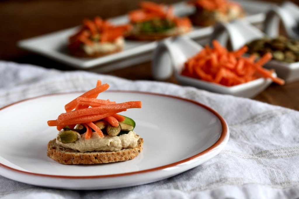 Craving a snack that’s heart healthy and just happens to be vegetarian and vegan? Then these Hummus Jalapeño Toastettes are for you! @cookinRD | sarahaasrdn.com