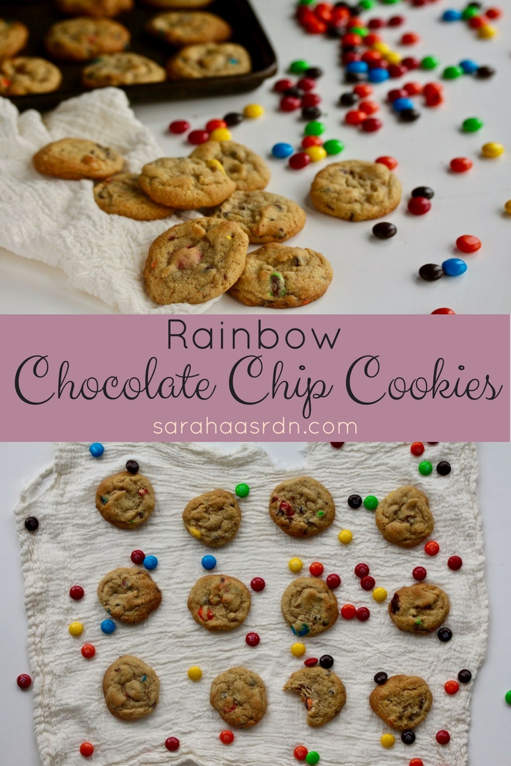 Sometimes you need to feel like a kid. That's why you need colorful chocolate covered candies in your cookies. Made with a little dose of whole grains and a little less sugar than other cookies, these Rainbow Chocolate Chip Cookies make the perfect sweet treat. @cookinRD | sarahaasrdn.com 