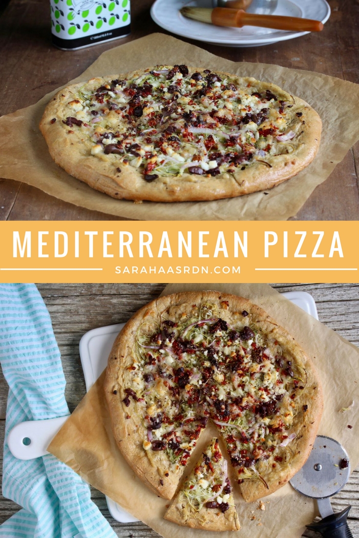 Looking for a fun, new way to enjoy pizza? Try this Mediterranean Pizza which starts with a layer of hummus and gets topped with tons of fresh veggies, feta cheese and olives! @cookinRD | sarahaasrdn.com 