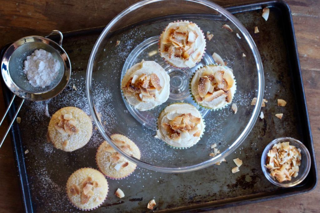 Cupcakes bring joy, so I make them. These Toasted Coconut Cupcakes are reasonably sized and better than the box versions! @cookinRD | sarahaasrdn.com
