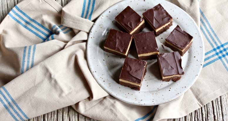 Have you ever had a buckeye brownie? If not, I'm about to change your world! Chocolate meets peanut butter in an oh so yummy way! Get the recipe now! @cookinRD | sarahaasrdn.com