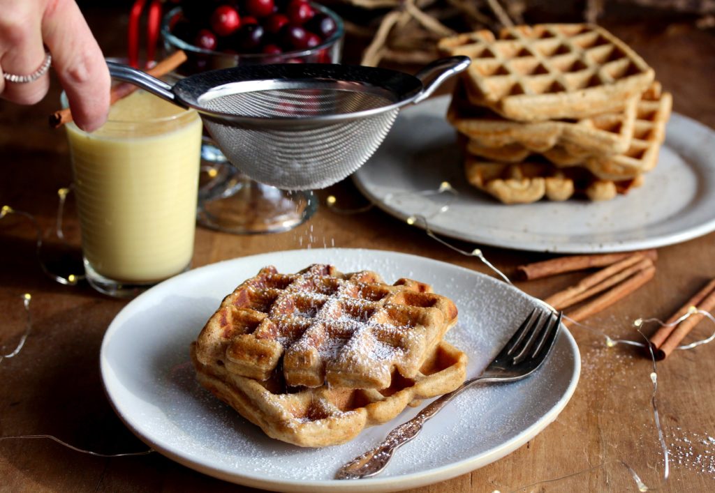 Got leftover eggnog in your fridge? Don't drink it! Use it to make these super delicious and EASY-to-make Whole Wheat Eggnog Waffles!