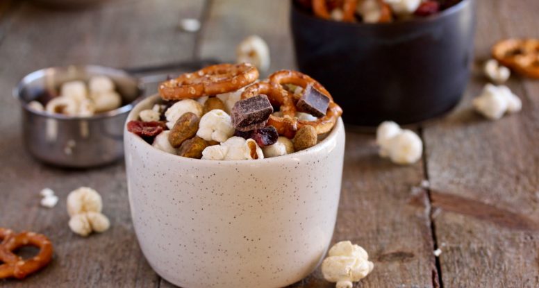 Need a delicious snack to feed your guests during the holidays? Look no further than this simple-to-make Holiday Snack Mix! @cookinRD | sarahaasrdn.com