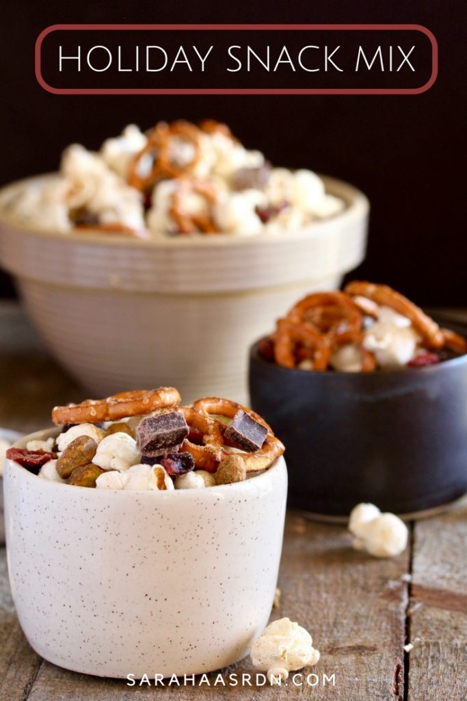 Need a delicious snack to feed your guests during the holidays? Look no further than this simple-to-make Holiday Snack Mix! @cookinRD | sarahaasrdn.com