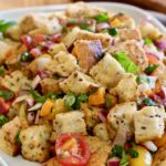 A delightful bread salad made with chewy whole grain baguette tossed with fresh tomatoes, basil and a simple vinaigrette. @cookinRD | sarahaasrdn.com