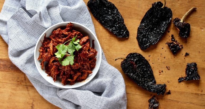 America’s Test Kitchen does it again! I’m in love with their Ancho Orange Pork. So much so, that I’ve re-created it as a slow cooker recipe! ! @cookinRD | sarahaasrdn.com