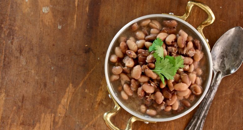 Boring beans? Not these Bacon Borracho Beans! Dry beans are transformed into something magical when infused with bacon and garlic! @cookinRD | sarahaasrdn.com