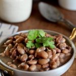 Boring beans? Not these Bacon Borracho Beans! Dry beans are transformed into something magical when infused with bacon and garlic! @cookinRD | sarahaasrdn.com