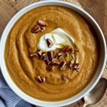Pumpkin spice isn’t just for sweet dishes! You’ll love this blend of spices when cooked with red lentils, yummy aromatics and pumpkin to make this Pumpkin Spice Lentil Soup! @cookinRD | sarahaasrdn.com