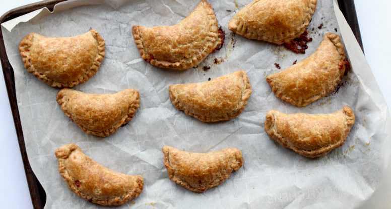 Wishing you had an appetizer that was easy to make, tasted delicious and was fun to eat? Well you do! These Homemade Holiday Empanadas festively tasty! @cookinRD | sarahaasrdn.com